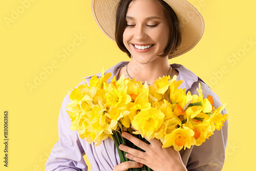Young woman in hat with daf...