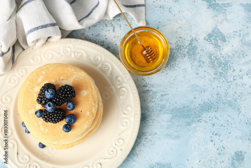 Plate of sweet pancakes wit...