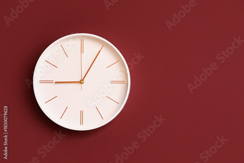 Stylish clock hanging on re...