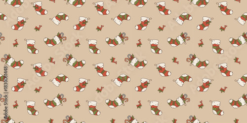 Christmas stockings seamless pattern. Holiday socks with candy cane and bow on beige background. Festive vector texture for greeting, invitation, textile, wrapping