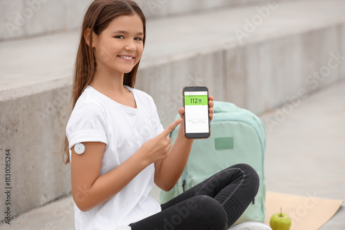 Teenage diabetic girl with ...