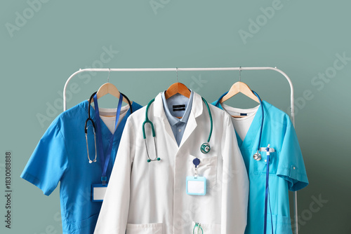 Rack with medical uniform o...