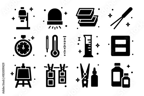 Darkroom Tools Icons. Darkroom Tools. Solid icons set of Darkroom Tools: enlarger, safe light, trays, tongs, timer, thermometer, graduated cylinder, negative
