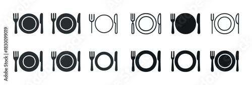Monochrome dining arrangement: cutlery and plates in linear patterns
