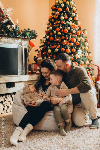 Family enjoying christmas holidays together in living room