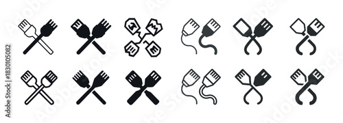 Set of black and white fork and spatula icons