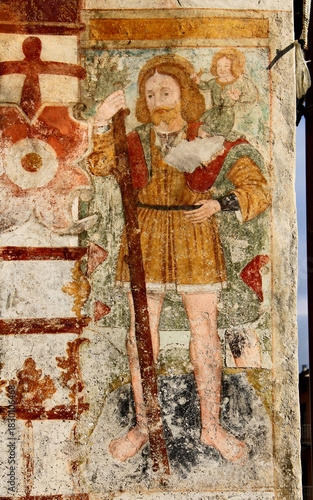 San Cristoforo; affresco esterno della chiesetta dei Santi Rocco e Defendente a Clusone (Val Seriana, Bergamo)