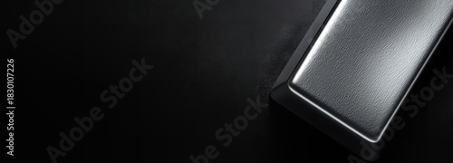 a plain silver ingot on Velvet, black theme