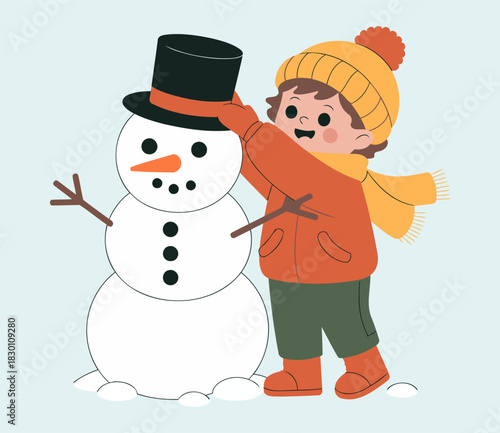 Happy Child in Winter Clothing Placing Hat on Snowman in Snowy Landscape