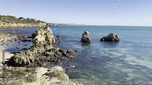 Rocky seashore. View of Praia da Vigia beach in Albufeira, Portugal, Europe