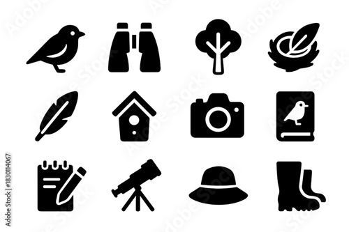 Wildlife Watching Icons. Wildlife watching. Solid icon set of Wildlife watching: bird, binoculars, tree, nest, feather, birdhouse, camera, field guide,