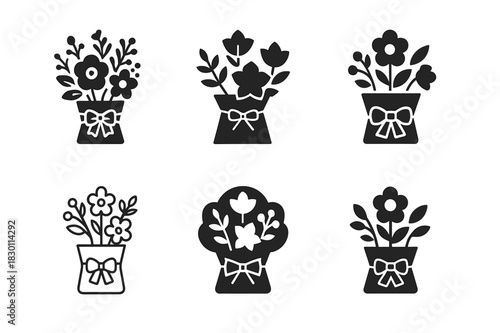 Festive Floral Icons. holiday-themed floral arrangements for tables. Icon set. Set Logo of holiday-themed floral arrangements for tables: festive bouquet with