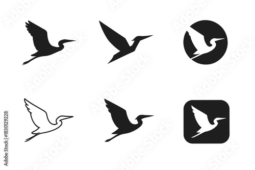 Heron Logo Variations. Herons. Icon set. Set Logo of Herons: flying heron silhouette. harmonious logo variations of the same emblematic concept, each with
