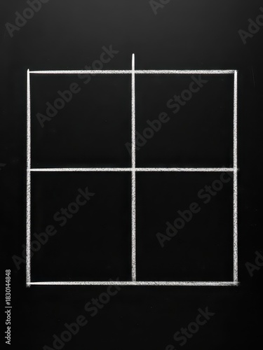 Simple white chalk four-quadrant matrix grid template hand drawn on a dark textured blackboard, perfect visual background for business planning, educational diagrams, and abstract strategy analysis.