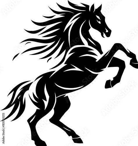 Majestic black stallion rearing up with flowing mane and tail in a powerful dynamic silhouette