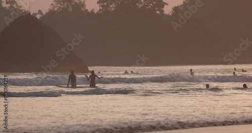 Public town beach in Weligama at sunset, Sri Lanka