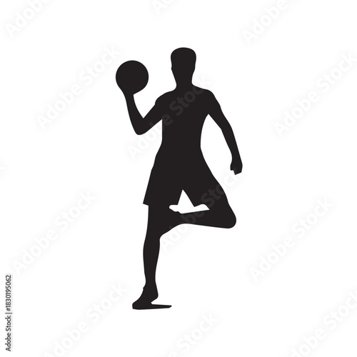 silhouette of a man playing basket ball