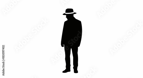 Silhouette of a man wearing a hat standing and looking down.