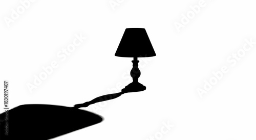 Silhouette of a Table Lamp Casting a Long Shadow.