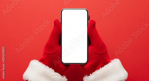 Santa Claus Hands Holding Blank Smartphone Mockup on Red