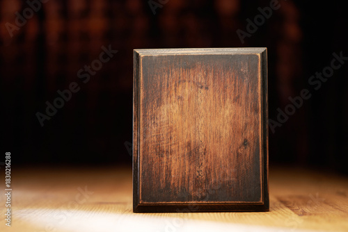 wood award plaque trophy on table top