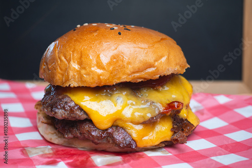 Delicious double cheeseburger with melted cheese.