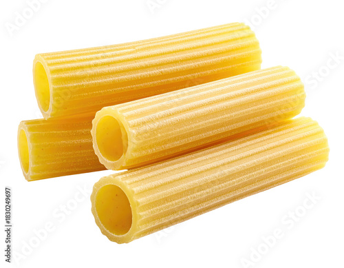 Stack of ribbed, dry, tube-shaped pasta on black