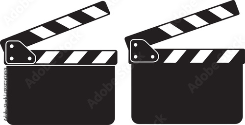 Two black clapperboards in silhouette