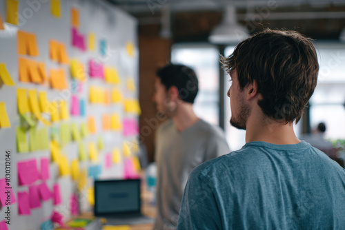 Agile team planning, sticky note wall, creative office, collaboration energy