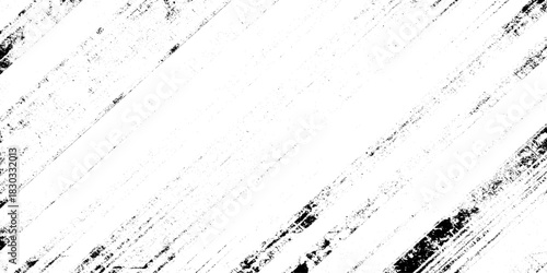 Abstract texture grunge made of diagonal streaks and distressed lines, black ink on a white background. grunge scratch patterns, chaotic linear noise. dirty monochrome pattern of the old worn surface.