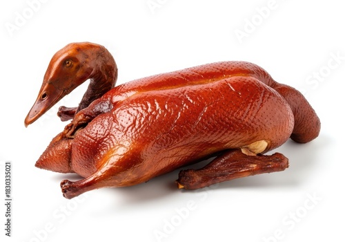 Delicious crispy whole roasted duck ready for serving and enjoyment isolated on white background