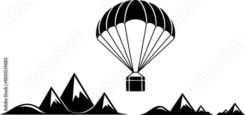 Black silhouette of a parachute carrying a box over mountains cargo delivery