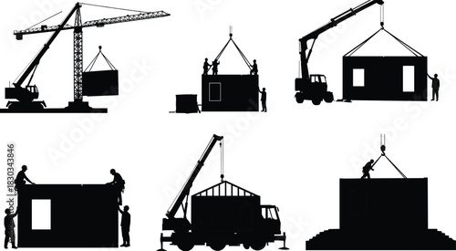 Silhouette of workers installing modular building panels with cranes at construction site during prefabricated house assembly and teamwork architectural process