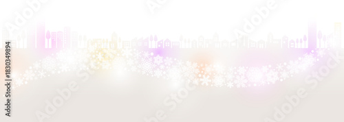 やさしい暖色系の幻想的な冬の街並みと雪の結晶イルミネーション