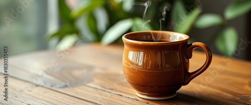 A steaming ceramic coffee cup on a wooden table, mocha, ceramic