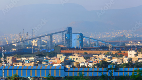 A large industrial conveyer connected to Visakhapatnam port in india to ship raw material such as steel and other products.
