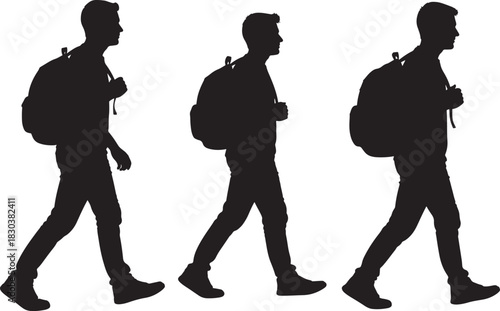 Three hikers walking with backpacks in silhouette