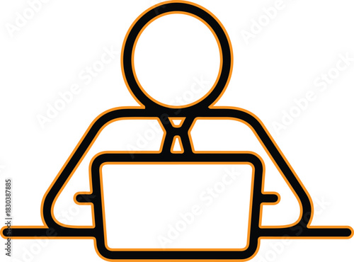 Business person working on laptop computer at desk