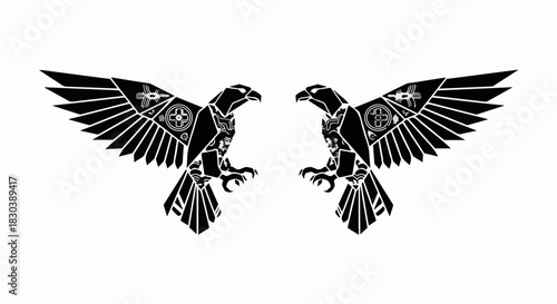 Two powerful black eagles with outstretched wings in a symmetrical design.