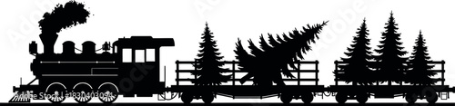Silhouette of steam train carrying christmas trees on flatcars