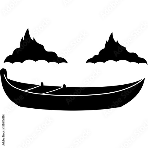 Black silhouette of a canoe with mountain peaks in the background
