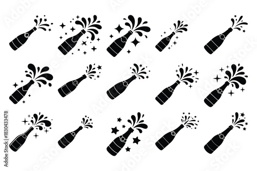Black champagne bottles with splashing liquid and stars