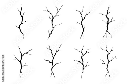 Eight separate vertical branching cracks and fissures creating a distressed texture effect