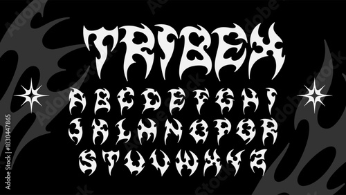 Tribal display typeface with sharp ornamental flame letterforms reflecting a dark Y2K cybersigilism aesthetic