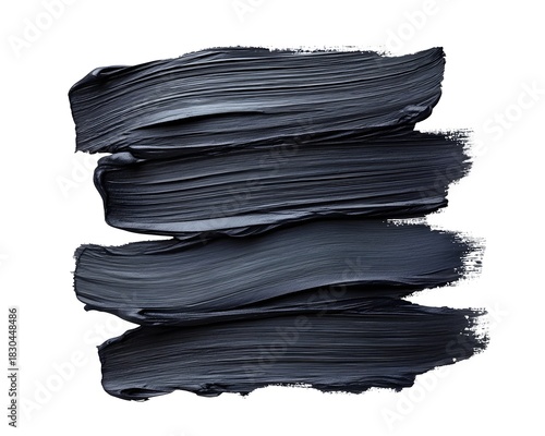 Thick, dark gray cosmetic or paint smears stacked horizontally on a white background