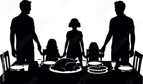 Family silhouettes enjoying a festive holiday dinner celebration