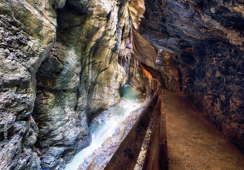 Summer Liechtensteinklamm gorge with stream and waterfalls in Austria Alps