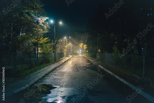 Fototapeta Naklejka Na Ścianę i Meble -  A small Balkan street at night in autumn
