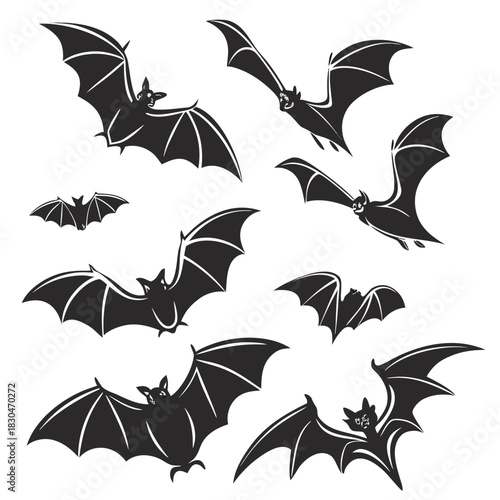 Vector illustration of collection of stylized black bat silhouettes in various flying poses, perfect for halloween or gothic themes