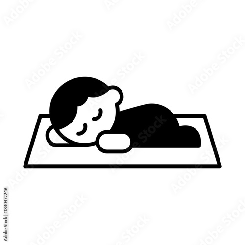 Child napping on mat
